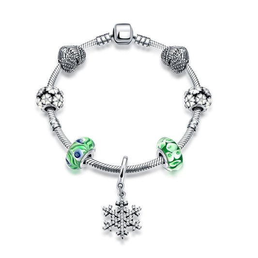 Snowflake Sterling Silver Bracelet with Green Accents